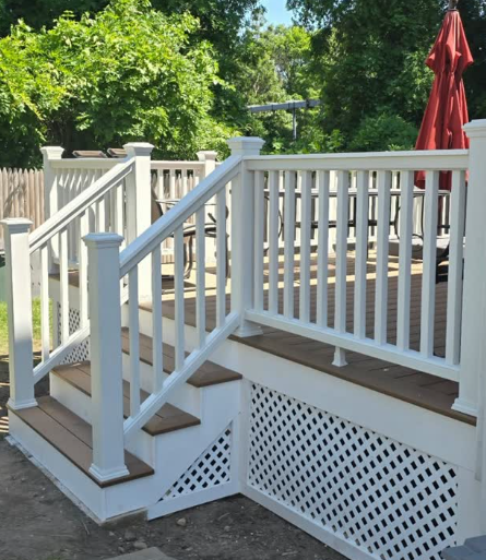 New composite deck with white railing and lattice skirting