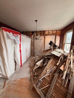 Before — bathroom gutted to the framing
