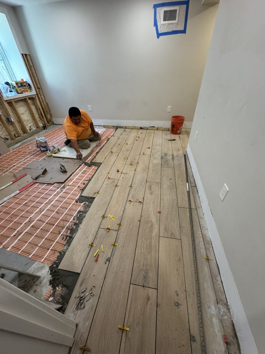 Flooring installation by High Pace Construction, featured in Westwood Living