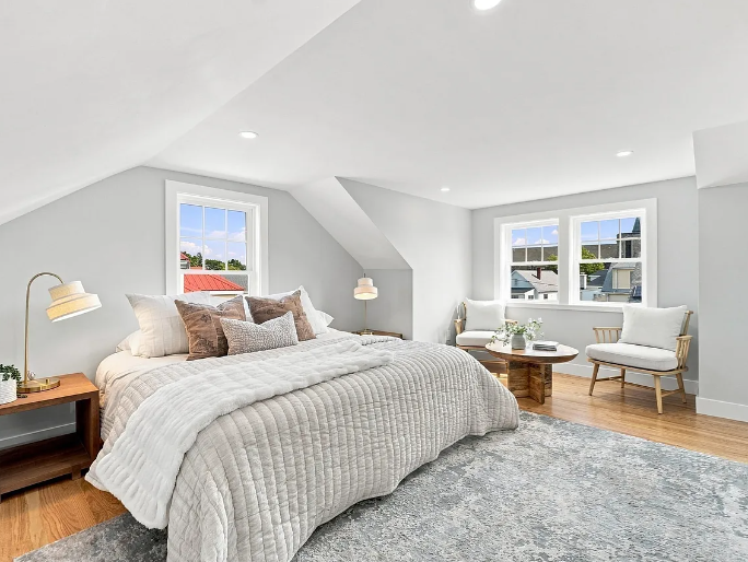 After — finished attic bedroom suite with hardwood floors