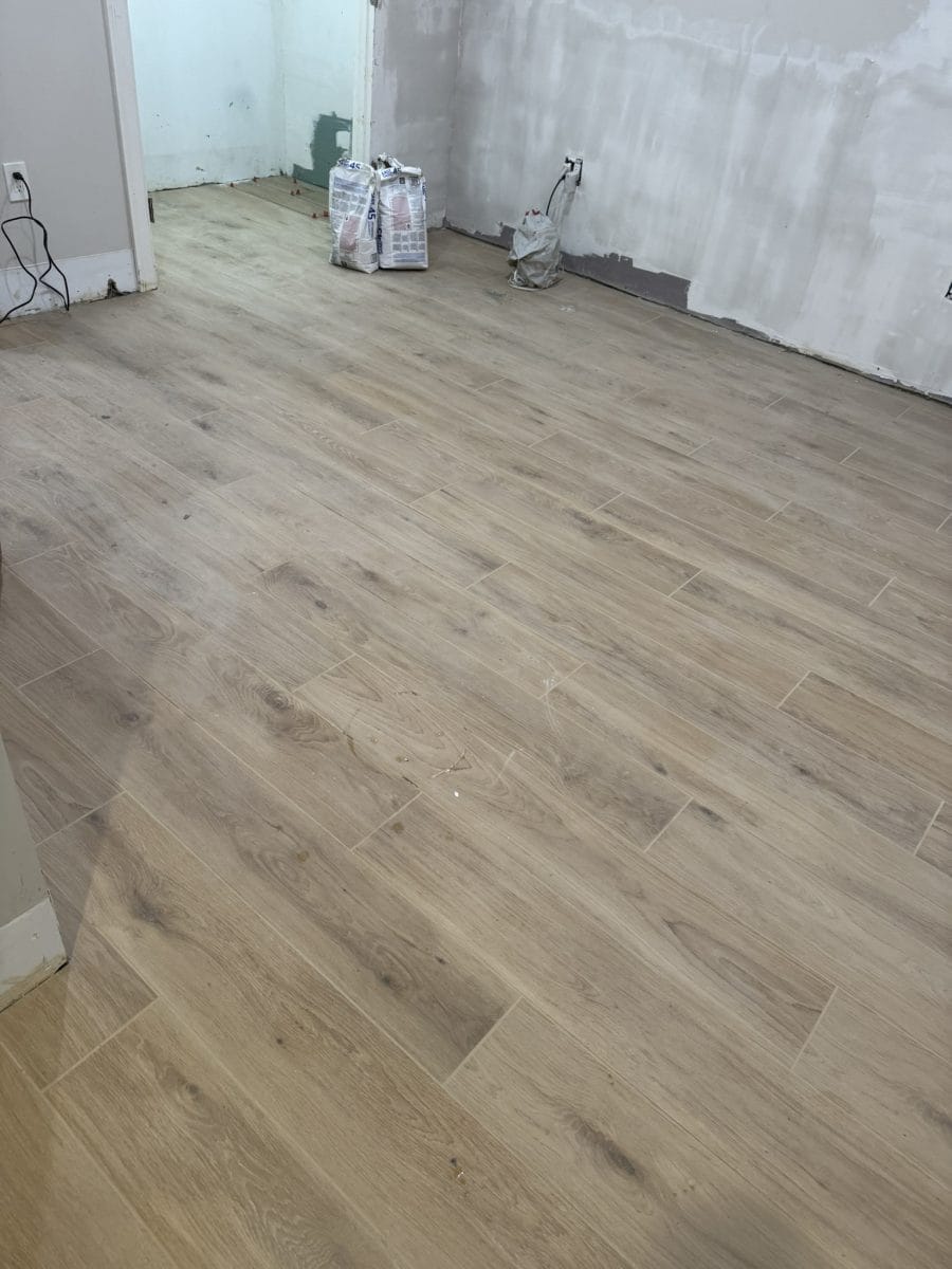 Flooring installation by High Pace Construction, featured in Westwood Living