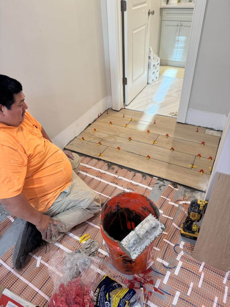 Flooring installation by High Pace Construction, featured in Westwood Living