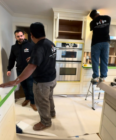 High Pace crew installing kitchen cabinetry