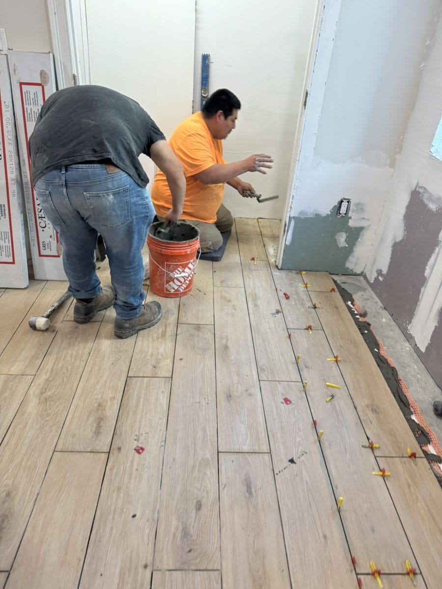 Flooring installation by High Pace Construction, featured in Westwood Living
