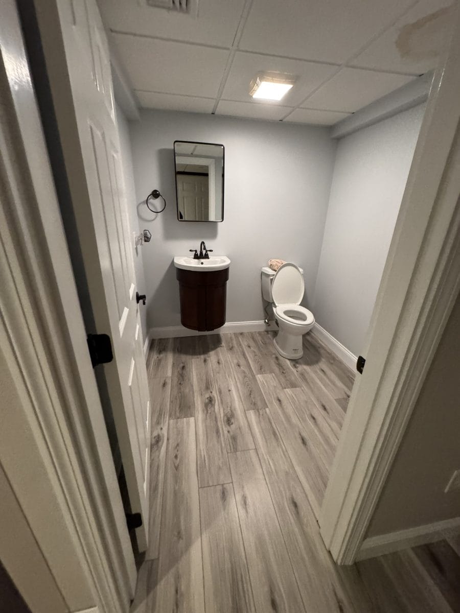 Finished basement by High Pace Construction, featured in Westwood Living